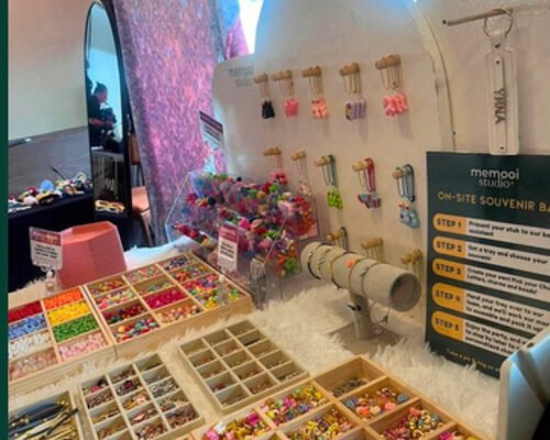 Studio souvenir bar under pink lighting