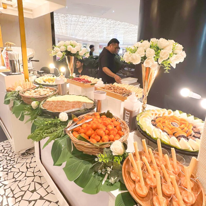 Cocktail hour spread close-up with staff
