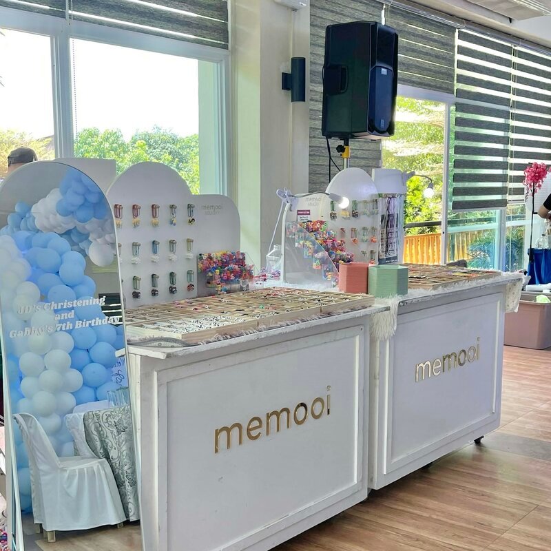 Studio souvenir cart at a christening and birthday party