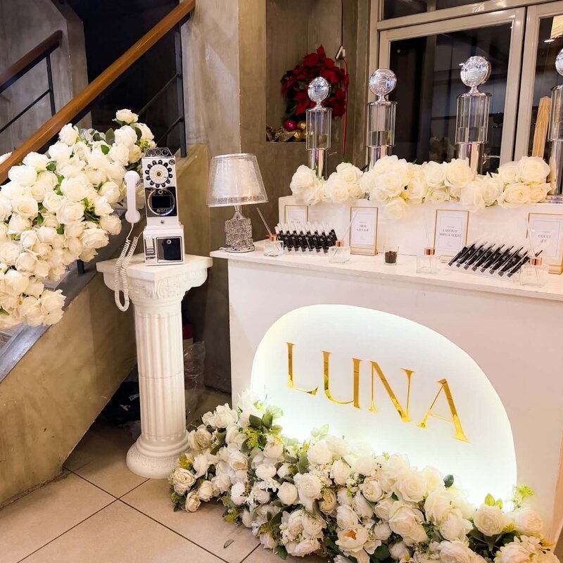Luna on-site perfume bar with roses