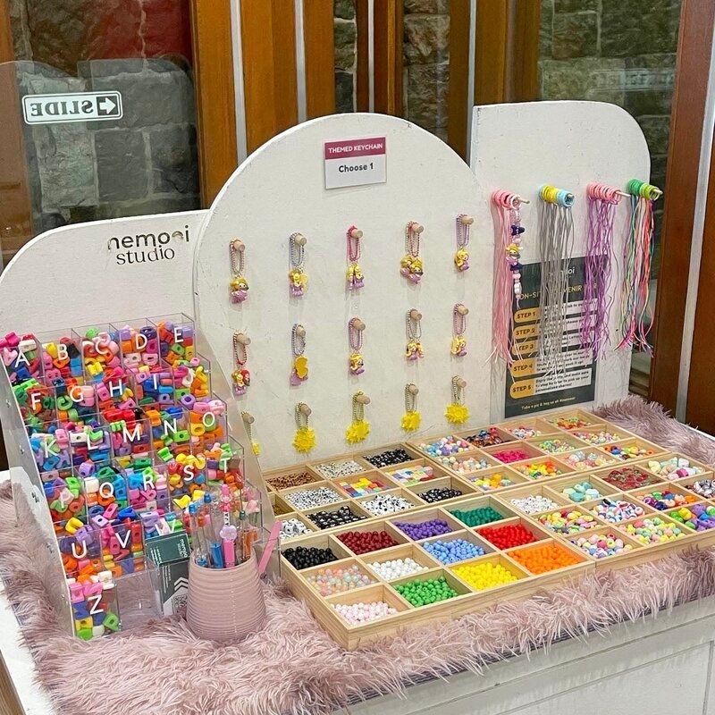 memooi studio souvenir panel with beads and letters